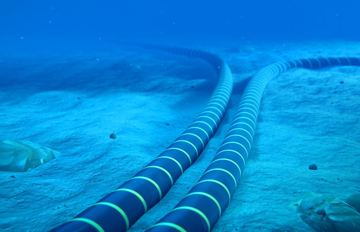 How is the undersea fiber optic cable laid and data transmission?